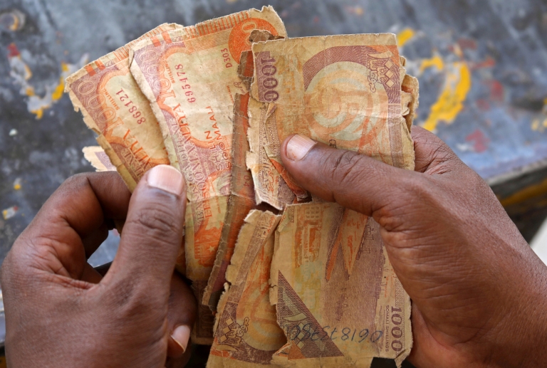 shilin somali Ganacsatada Muqdisho oo diiday qaadashada lacagta Shilin Somaliga ah